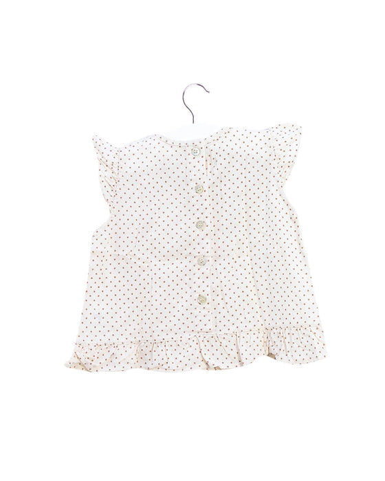 A Peach Sleeveless Tops from Babe & Tess in size 3-6M for girl. (Back View)