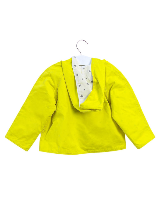 A Yellow Lightweight Jackets from Nanos in size 12-18M for girl. (Back View)