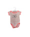 A Pink Short Sleeve Bodysuits from IKKS in size 6-12M for girl. (Front View)