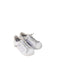 A White Sneakers from Adidas in size 5T for girl. (Front View)