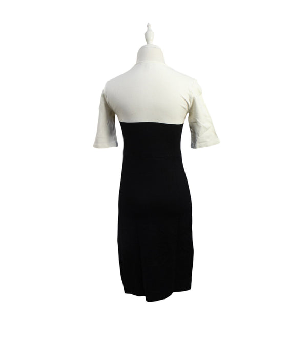 A Black Short Sleeve Dresses from Isabella Oliver in size XS for maternity. (Back View)