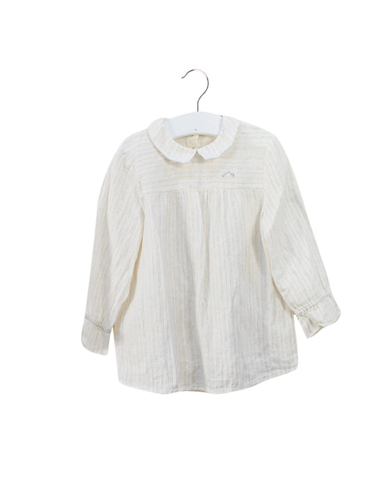 A White Long Sleeve Tops from Nanos in size 4T for girl. (Front View)