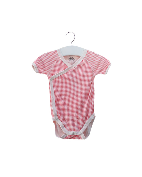 A Pink Short Sleeve Bodysuits from Petit Bateau in size 0-3M for girl. (Front View)