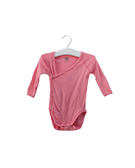 A Pink Long Sleeve Bodysuits from Petit Bateau in size 0-3M for girl. (Front View)