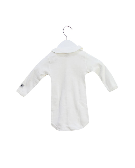 A White Long Sleeve Bodysuits from Petit Bateau in size 0-3M for girl. (Back View)