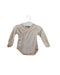 A Beige Long Sleeve Bodysuits from Natures Purest in size 0-3M for neutral. (Front View)