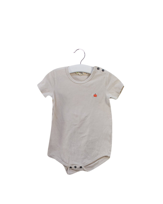 A Beige Short Sleeve Bodysuits from The Bonnie Mob in size 6-12M for girl. (Front View)