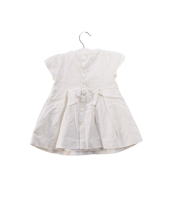A Ivory Short Sleeve Dresses from Jacadi in size 3-6M for girl. (Back View)