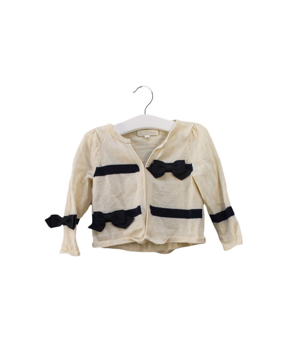 A Ivory Cardigans from Nicholas & Bears in size 6-12M for girl. (Front View)