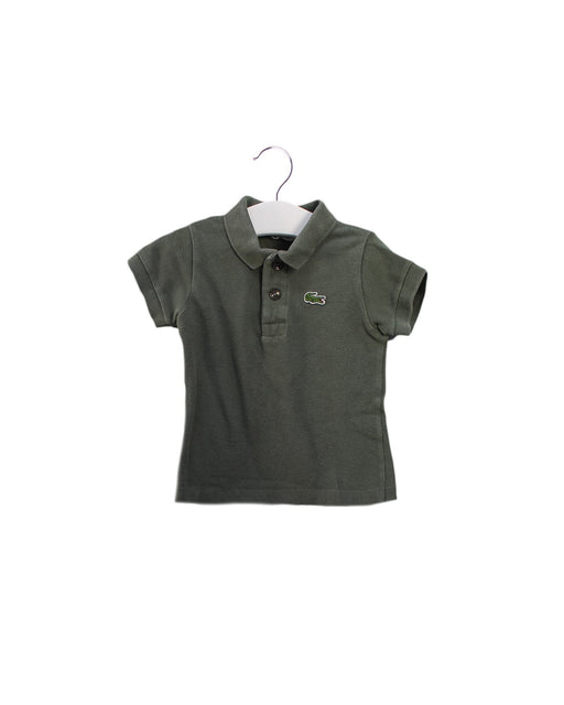 A Green Short Sleeve Polos from Lacoste in size 6-12M for boy. (Front View)