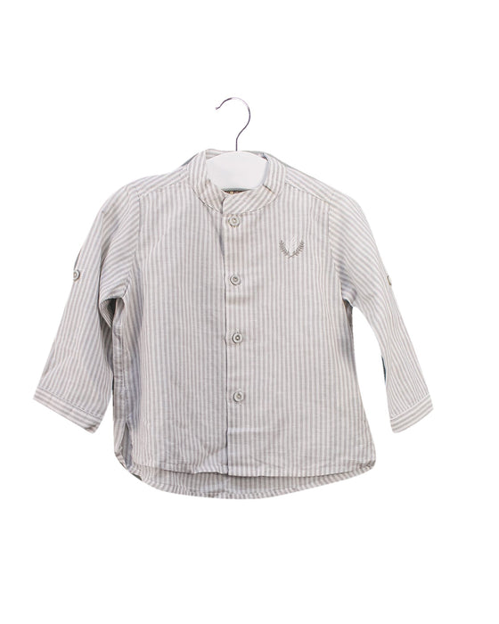 A White Shirts from Pili Carrera in size 6-12M for boy. (Front View)