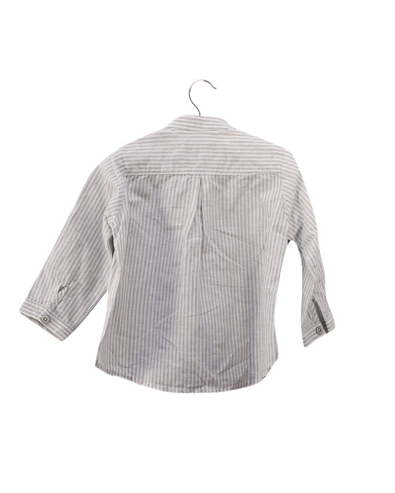 A White Shirts from Pili Carrera in size 6-12M for boy. (Back View)