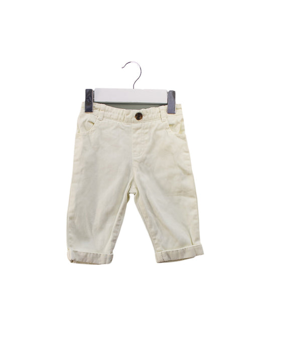 A Ivory Casual Pants from Marie Chantal in size 3-6M for girl. (Front View)