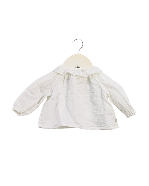 A White Long Sleeve Tops from Bonton in size 0-3M for girl. (Front View)