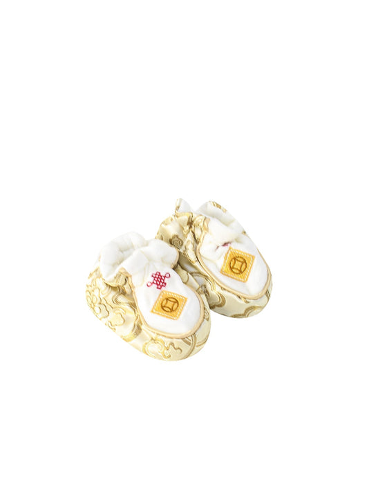 A Gold Booties from Mides in size 6-12M for neutral. (Front View)