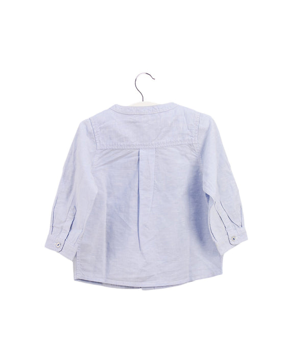 A Blue Shirts from Jacadi in size 6-12M for girl. (Back View)