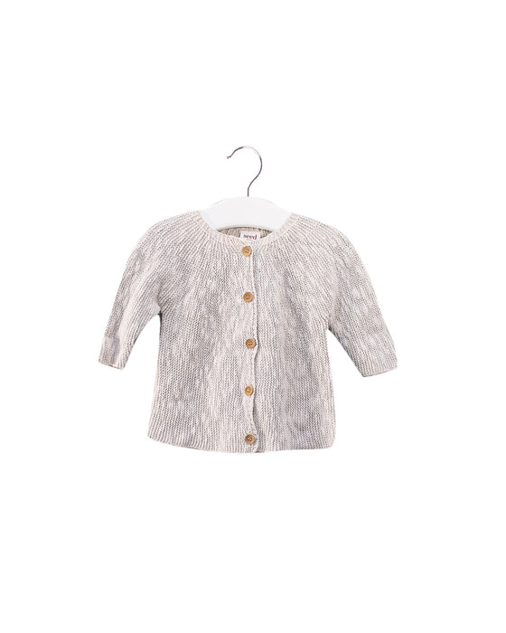A Ivory Cardigans from Seed in size 0-3M for girl. (Front View)