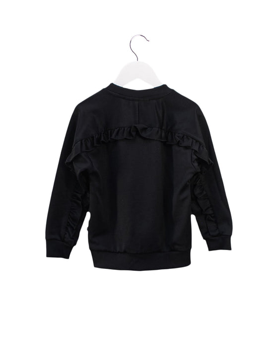 A Black Crewneck Sweatshirts from Molo in size 5T for girl. (Back View)