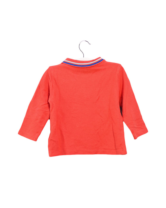 A Orange Long Sleeve Polos from La Compagnie des Petits in size 12-18M for boy. (Back View)