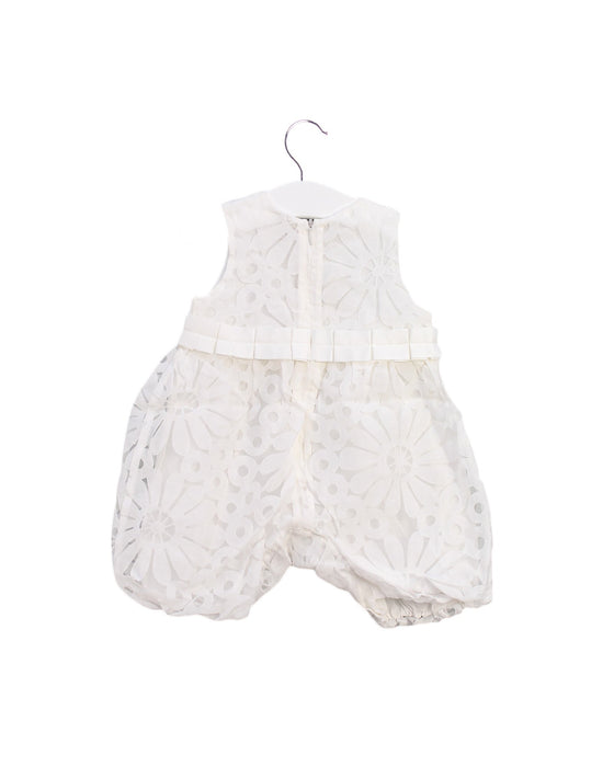A White Rompers from Chickeeduck in size 6-12M for girl. (Back View)