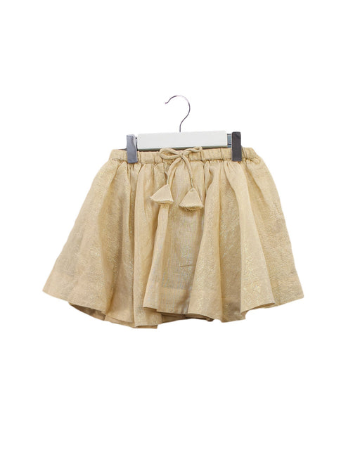 A Gold Short Skirts from Bonpoint in size 4T for girl. (Front View)