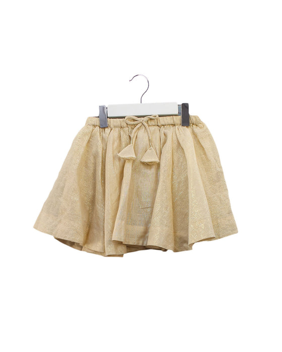 A Gold Short Skirts from Bonpoint in size 4T for girl. (Front View)