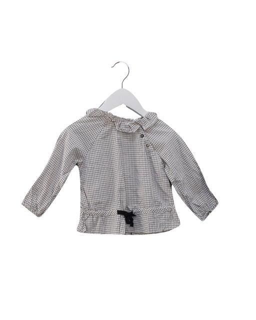 A Black Long Sleeve Tops from Jacadi in size 6-12M for girl. (Front View)