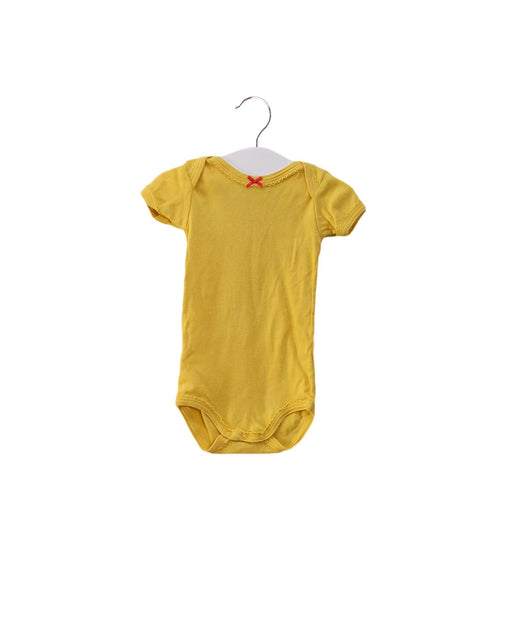 A Yellow Short Sleeve Bodysuits from Petit Bateau in size 0-3M for girl. (Front View)