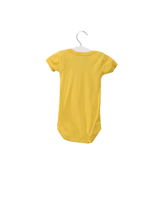 A Yellow Short Sleeve Bodysuits from Petit Bateau in size 0-3M for girl. (Back View)