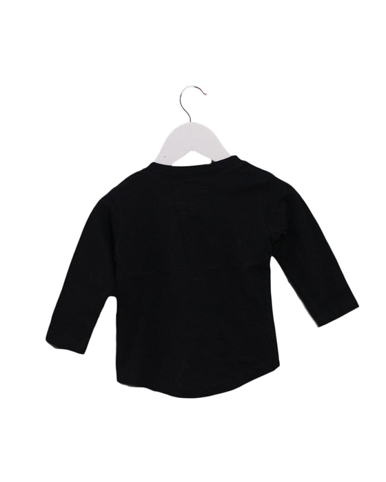 A Black Long Sleeve Tops from Huxbaby in size 6-12M for girl. (Back View)