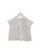 A White Short Sleeve Tops from Nanos in size 6-12M for girl. (Front View)