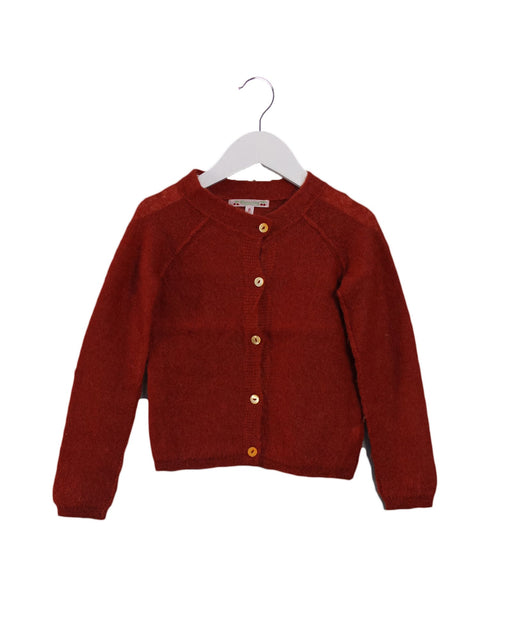 A Orange Cardigans from Bonpoint in size 6T for girl. (Front View)