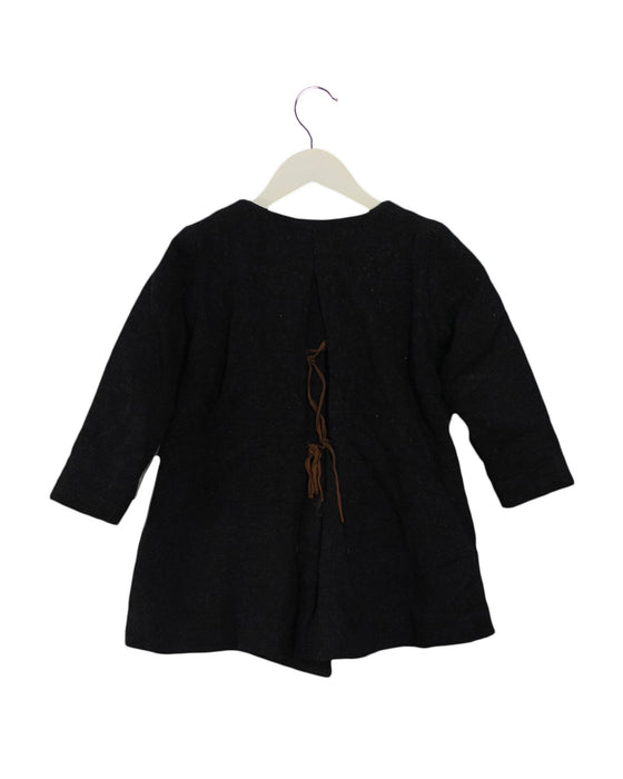 A Black Coats from Noro in size 6T for girl. (Back View)