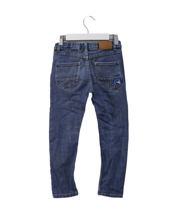 A Blue Jeans from La Compagnie des Petits in size 6T for girl. (Back View)