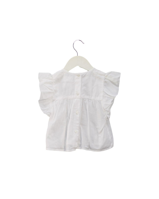 A Ivory Short Sleeve Tops from Louis Louise in size 6-12M for girl. (Back View)