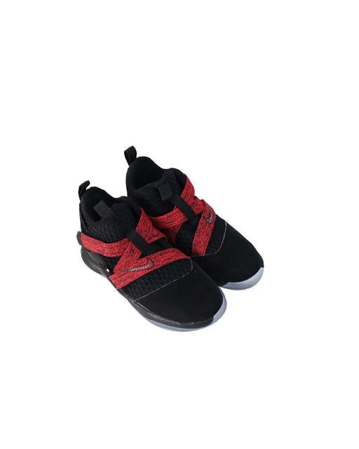 A Black Sneakers from Nike in size 6T for boy. (Front View)