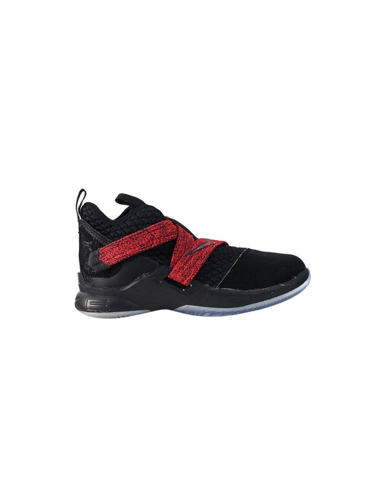 A Black Sneakers from Nike in size 6T for boy. (Back View)
