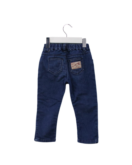 A Blue Jeans from Petit Bateau in size 12-18M for boy. (Back View)