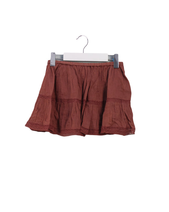 A Brown Short Skirts from Bonpoint in size 4T for girl. (Front View)