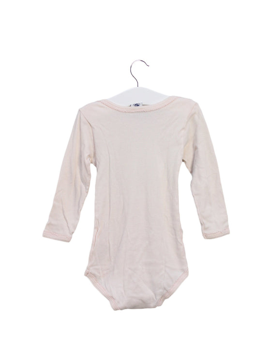 A Pink Long Sleeve Bodysuits from Petit Bateau in size 12-18M for girl. (Back View)