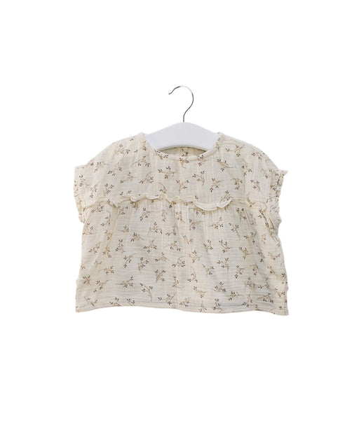 A Ivory Sleeveless Tops from Marlot Paris in size 6-12M for girl. (Front View)