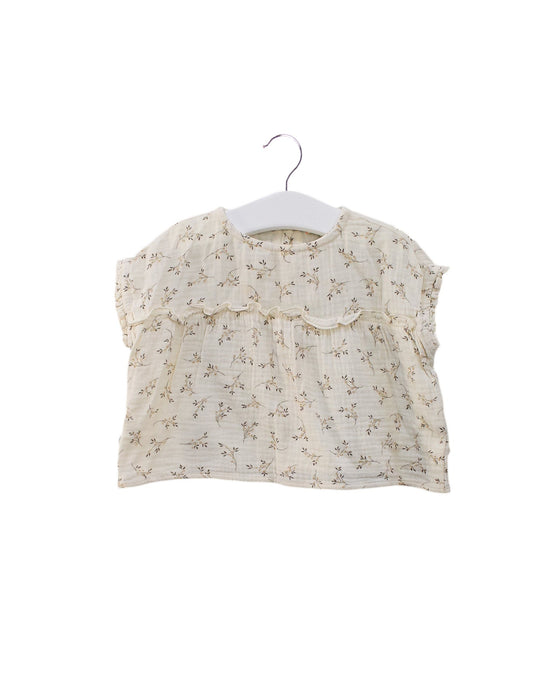 A Ivory Sleeveless Tops from Marlot Paris in size 6-12M for girl. (Front View)