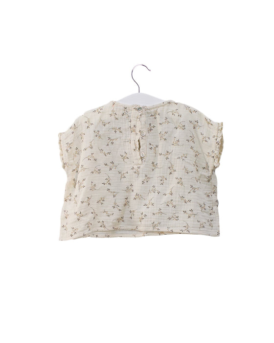 A Ivory Sleeveless Tops from Marlot Paris in size 6-12M for girl. (Back View)