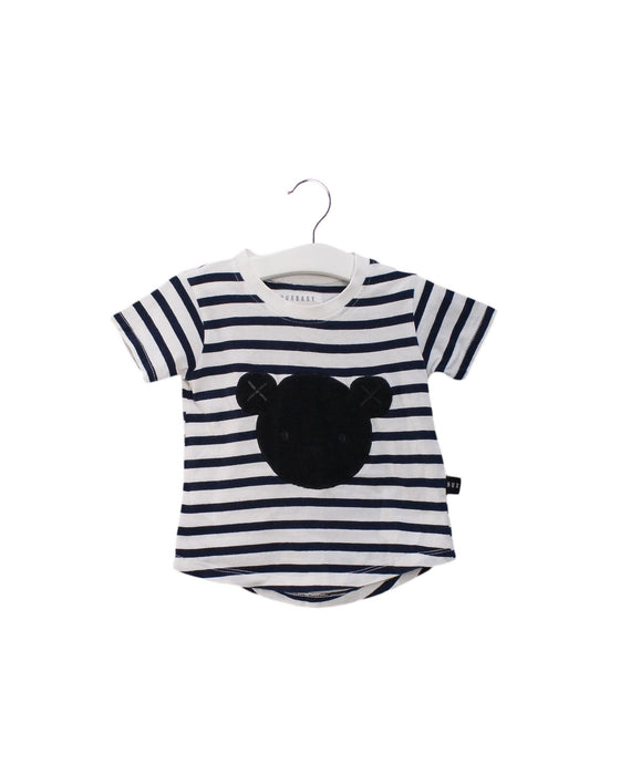 A Navy Short Sleeve T Shirts from Huxbaby in size 12-18M for girl. (Front View)