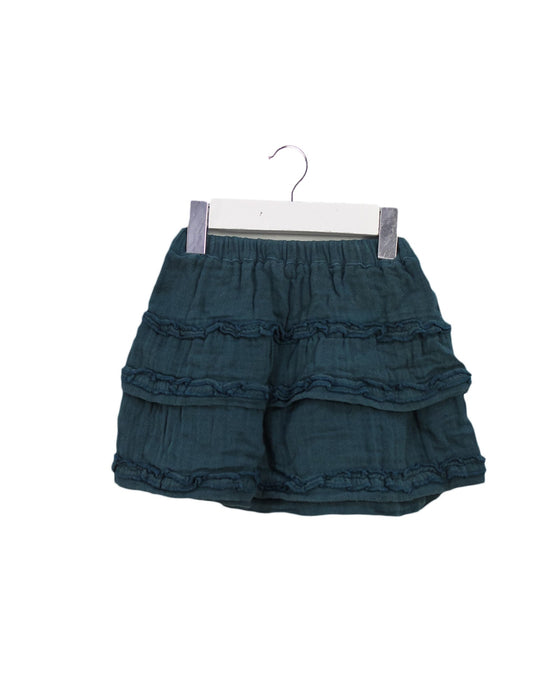 A Green Short Skirts from Babu in size 6-12M for girl. (Front View)
