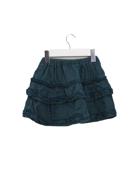 A Green Short Skirts from Babu in size 6-12M for girl. (Back View)