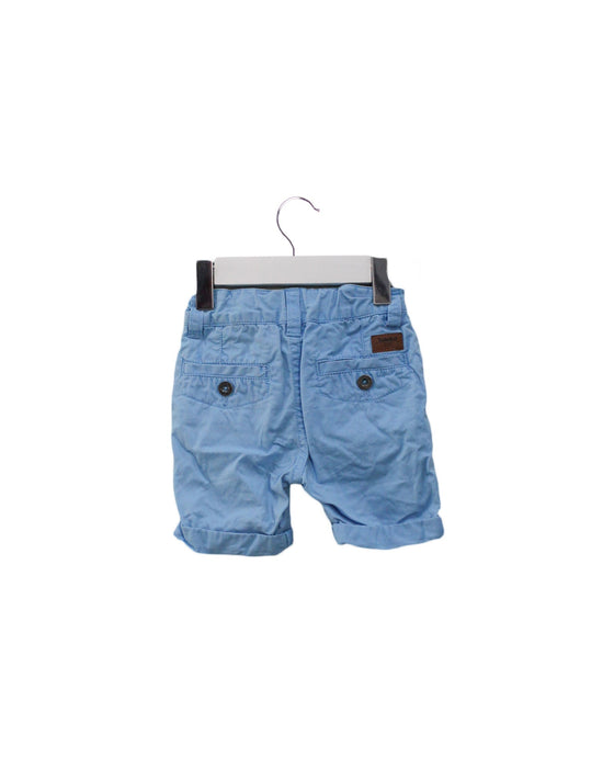 A Blue Shorts from Timberland in size 3-6M for boy. (Back View)