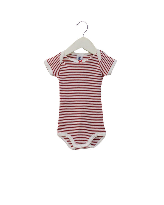 A Red Short Sleeve Bodysuits from Petit Bateau in size 3-6M for girl. (Front View)