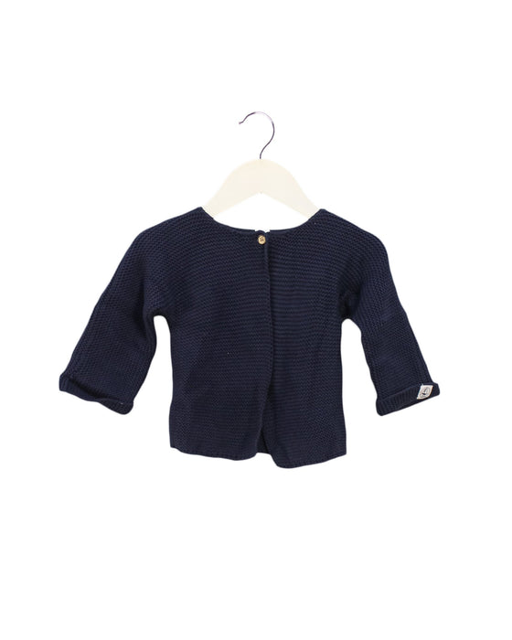 A Navy Cardigans from Petit Bateau in size 6-12M for girl. (Front View)