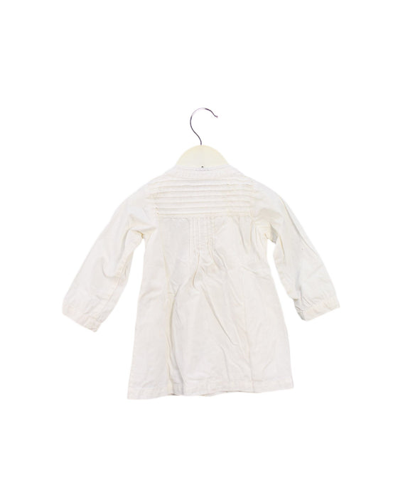 A Ivory Long Sleeve Dresses from Noa Noa Miniature in size 6-12M for girl. (Back View)